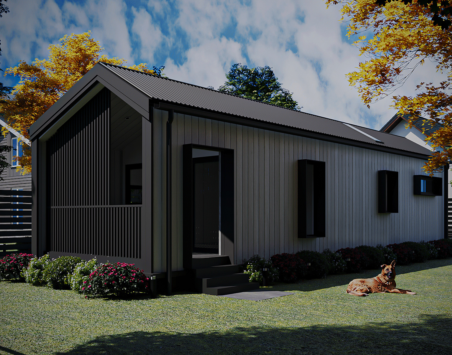 Angled front-left perspective of the 1-Bedroom modular home showcasing side cladding, roofline, and timber deck (Lexicon Half light grey vertical cladding with dark Basalt roof and trim, captured under clear daylight).